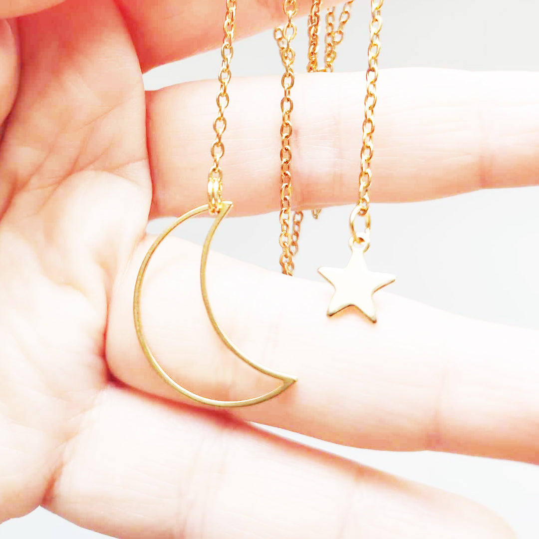 Collana Stella e Luna in acciaio inox dorato
